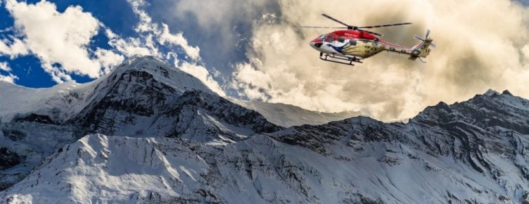 Helicopter landing on a mountain