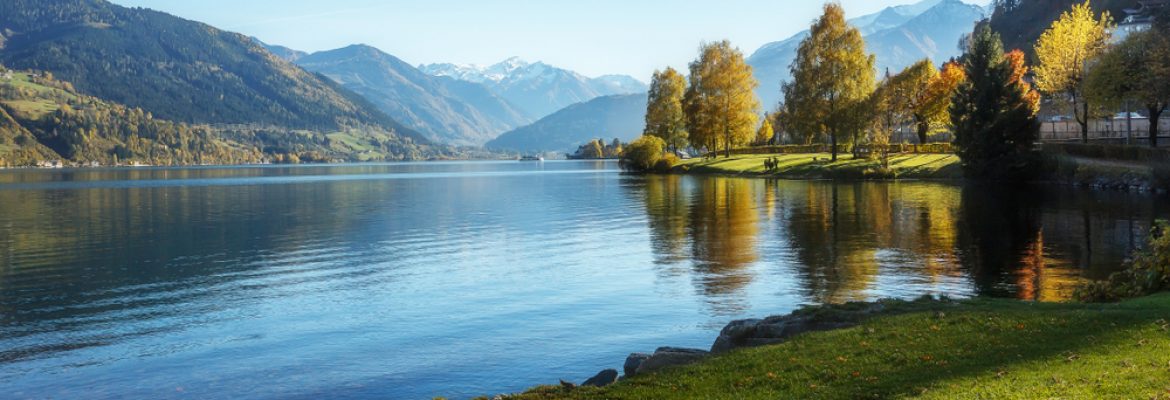 Amazing landscape of alpine lake with crystal clear green water and Perfect blue sky.Image( Yevhenii Chul)s