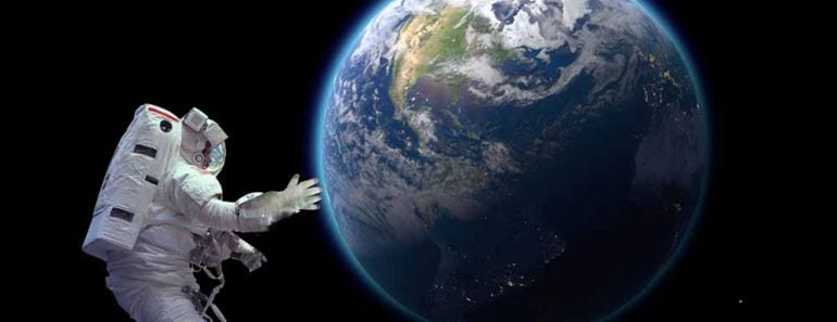 Astronaut in space looking at earth