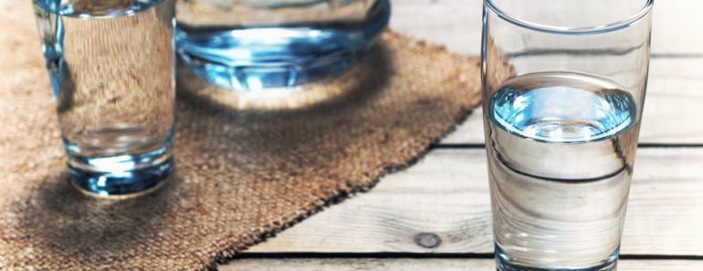 Glasses of water on a wooden table. Selective focus. Shallow DOF - Image( SedovaY)s