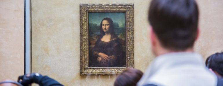 PARIS - AUGUST 4 Visitors take photo of Leonardo DaVinci's Mona Lisa at the Louvre Museum, August 4, 2012 in Paris, France. The painting is one of the world's most famous- Image(S-F)s