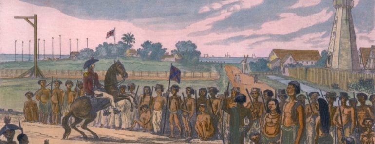 Natives of the colony of British Guiana are reviewed prior to their clean up operations( Everett Historical)s