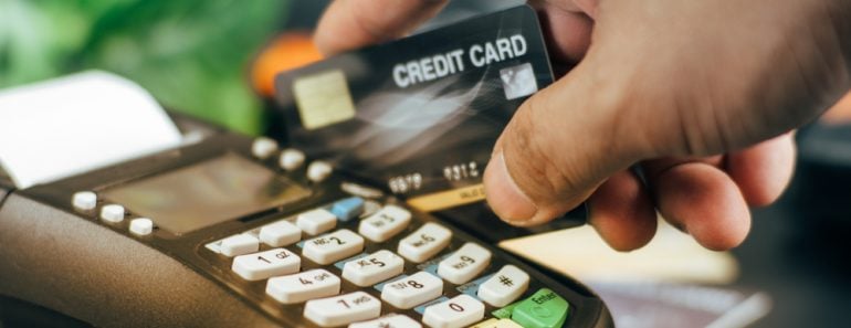 businessman hand pushing the button and swipe credit(Sakoodter Stocker)s