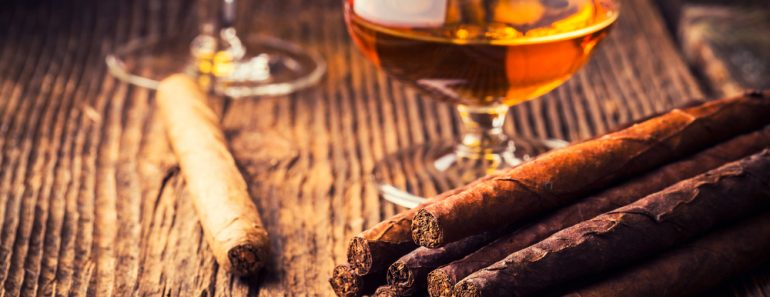 quality cigars and cognac on an old wooden table(Adrian_am13)s