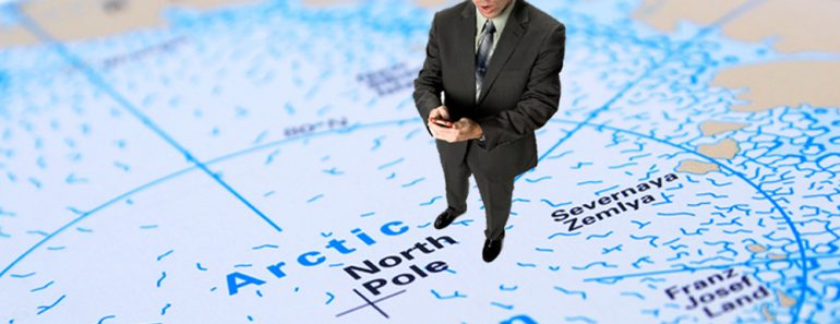 The confused man is standing on the north pole with a mobile