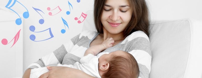 Mother with sleeping baby sitting in armchair(Africa Studio)s