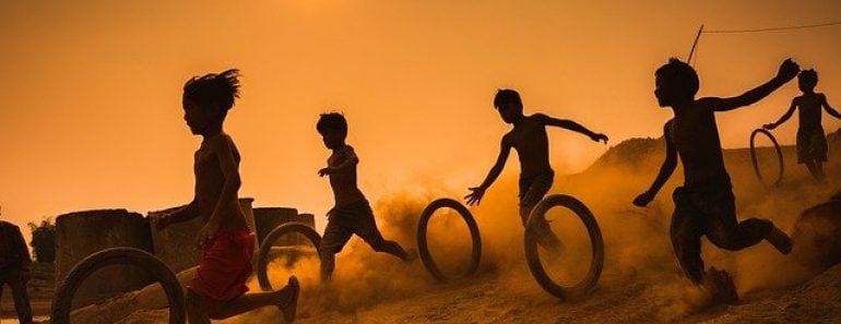 children playing with tire