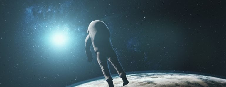 Astronaut against realistic planet Earth starlight. Back view of spaceman in outer space illuminated mainland surface. 3d animation. Science and technology. Elements of this media furnished by NASA.