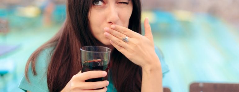 Woman,Reacting,After,Having,A,Fizzy,Soda,Drink.,Funny,Female