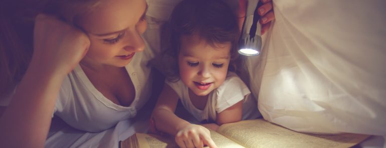 Family,Bedtime.,Mom,And,Child,Daughter,Reading,A,Book,With